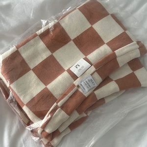 Brand new. Size Medium checkered dress.